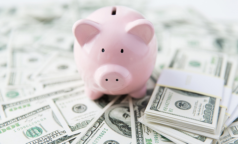 Image of piggy bank and cash - save money with new HVAC from Lockey Heating and Air